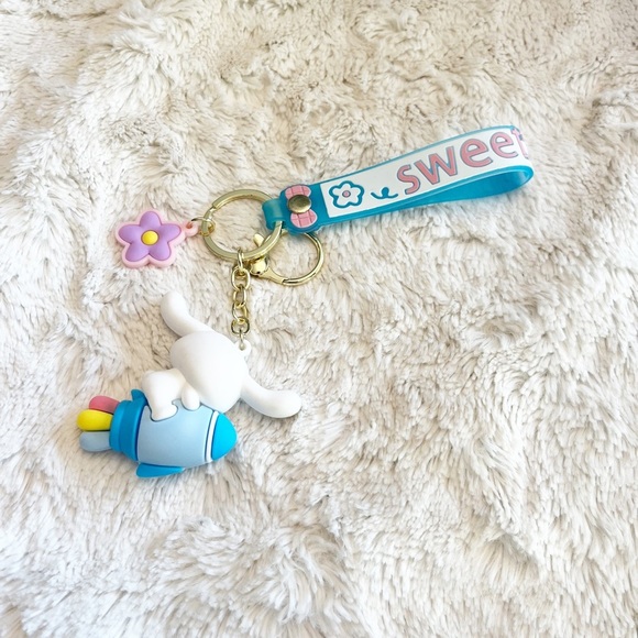 Sanrio Cinnamoroll on a Rocket Keychain Wristlet Bag Charm - Picture 2 of 2